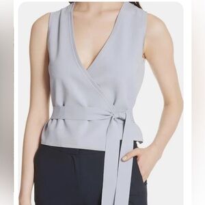 NWT Diane Von Furstenberg wrap top. Black size L